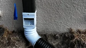 how to drain water from a low spot in the yard