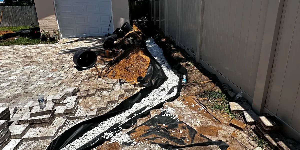 how to stop water from pooling on deck or patio